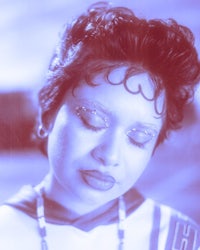 an image of a woman with her eyes closed