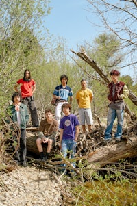 a group of boys posing for a picture