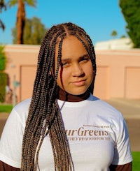 a woman wearing a white t - shirt