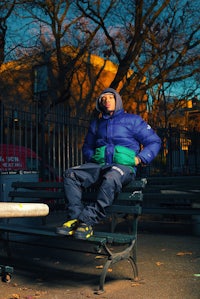 a man sitting on a bench