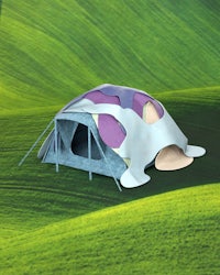 a 3d model of a tent on a green field