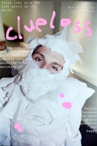 the cover of a magazine with a person in a white costume